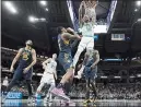  ?? AJ MAST — THE ASSOCIATED PRESS ?? The Hornets’ Kelly Oubre Jr. dunks for two of his 39points during Charlotte’s 158-126 victory over the Pacers at Indiana.