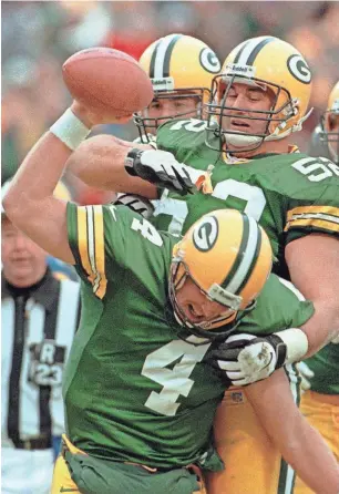  ?? ASSOCIATED PRESS ?? Center Frank Winters (52) said it would be difficult to leave the Packers as a free agent due to his close relationsh­ip with Brett Favre.