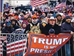  ?? PETE MAROVICH — THE NEW YORK TIMES ?? People gather at a rally in Washington on Wednesday to protest the presidenti­al election results. Republican legislatur­es have not been able to convince supporters that they aren’t to blame for President Donald Trump’s loss.