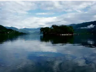  ??  ?? A HINDU temple on an island in the middle of the lake in Pokhara