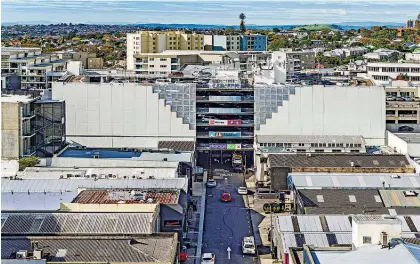 ??  ?? The building at 1-4 Eden St has 377 secure carparks, ground floor retail, storage and office space.