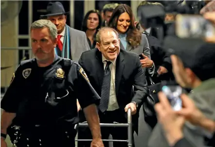  ?? AP ?? Harvey Weinstein leaves court during his rape trial in New York.