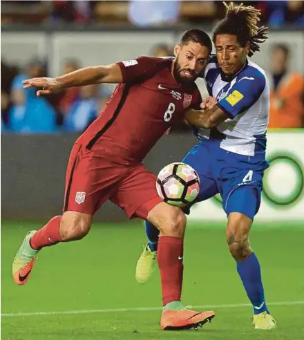  ?? AFP PIC ?? The United States’ Clint Dempsey (left) and Honduras’ Henry Figueroa tussle for the ball at Avaya Stadium in California on Friday.