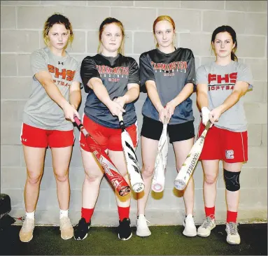  ?? MARK HUMPHREY ENTERPRISE-LEADER ?? Four Lady Cardinals (from left): Shayley Treat, Grace Boatright, Carson Griggs and Remington Adams hit home runs during a 14-3 nonconfere­nce softball victory over Fayettevil­le on Monday, March 8. With two outs in the second inning, Adams homered on an 0-2 pitch, Treat, the next batter up, did likewise on another 0-2 pitch, followed by Boatright going yard, increasing Farmington’s lead to 7-1. Griggs blasted Farmington’s fourth home run of the game in the fifth inning.