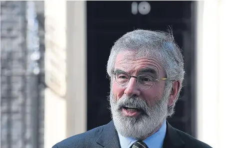  ?? Picture: Getty. ?? Gerry Adams has warned Theresa May over a deal between the DUP and the Conservati­ves.