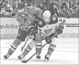  ?? Richard W. Rodriguez Associated Press ?? ONDREJ KASE of the Ducks reaches in to steal the puck from Stars center Tyler Seguin in the first period. The Ducks lost for the second night in a row.