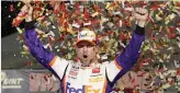  ?? GETTY IMAGES ?? Denny Hamlin celebrates in Victory Lane Sunday.