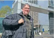  ?? AP PHOTO/DAKE KANG ?? David Moser, an American and associate professor at Capital Normal University in Beijing, poses for a photo at the university March 22 in Beijing, China.