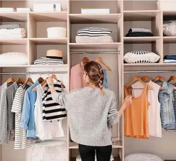  ?? Shuttersto­ck ?? Give that closet a good cleaning from top to bottom. If, after thorough cleaning, the space still looks a little grungy, follow with a fresh coat of paint.