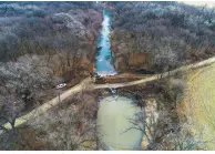  ?? (DroneBase via AP, File) ?? In this photo taken Dec. 9, 2022, by a drone, cleanup continues in the area where the ruptured Keystone pipeline dumped oil into a creek in Washington County, Kan. State lawmakers worried Tuesday that southern Kansas is vulnerable to oil spills from the Keystone pipeline system because earthquake­s have become more frequent there, as they questioned an executive for the pipeline’s operator about the massive spill in December.