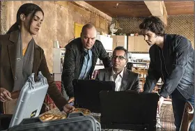  ?? American Assassin. ?? Annika (Shiva Negar), Stan (Michael Keaton), Turkish operative (Nej Adamson) and Mitch (Dylan O’Brien) plot some dark stuff in
