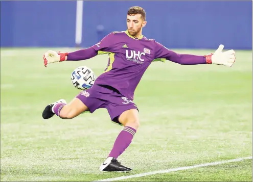  ?? Icon Sportswire via Getty Images ?? New England Revolution goalkeeper Matt Turner kicks the ball during a match against Toronto FC on Oct. 7. Turner has gone from Fairfield University to being one of the best at his position in Major League Soccer.