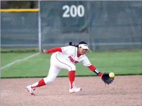  ?? RECORDER PHOTO BY NAYIRAH DOSU ?? Portervill­e College third baseman, Chelsea Ramos, fields a ball Tuesday, March 12, in the second game of a doublehead­er against Fresno City College at Portervill­e College.