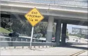  ?? Brian van der Brug Los Angeles Times ?? THE TERMINUS of the 710 Freeway sends freight traffic spilling onto local streets near Alhambra.