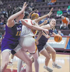  ?? Matt Gentry The Associated Press ?? South Dakota State forward Mya Selland eyes the basket in overtime of the Jackrabbit­s’ win over Southern California at Cassell Coliseum.