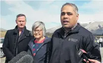  ??  ?? Civil Defence Minister Peeni Henare (right), accompanie­d by Waitaki Mayor Gary Kircher and Conservati­on Minister Eugenie Sage, addresses media in Lake Ohau Rd during his visit to the area yesterday.