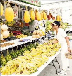  ??  ?? Tropical fruit in a local market