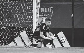  ?? JEROME MIRON USA TODAY NETWORK ?? FC Dallas goalkeeper Maarten Paes makes a save on a Austin FC shot during Saturday’s second half at home.