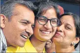  ?? PTI PHOTO ?? AIIMS topper Eliza Bansal celebrates her success with her parents in Patiala, on Monday.