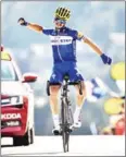  ?? AFP ?? Julian Alaphilipp­e celebrates as he wins the stage 10 of the 105th Tour de France on Tuesday.
