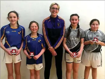  ??  ?? The girls’ Under-12 doubles finalists with Juvenile Secretary Marguerite Gore.