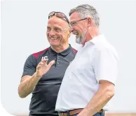  ??  ?? Red Lichties boss Dick Campbell shares a joke with his Hearts counterpar­t, Craig Levein