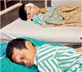  ?? — P. SURENDRA ?? Children admitted to Sarojini Devi Eye Hospital with cracker-related injuries.