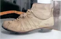  ?? The Comrades Museum ?? ONE of the actual rugby boots that carried Bill Payn to a Comrades finish in 1922.