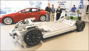  ?? Bob Luckey Jr. / Hearst Connecticu­t Media file photo ?? The official first day of business at the Tesla store in Greenwich in 2016.
