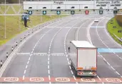  ?? JOHN SIBLEY/REUTERS ?? A truck arrives at the Eurotunnel check-in in Folkstone.
Truckers will be exempt from Britain's quarantine.