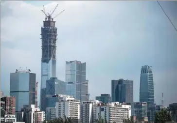  ?? FRED DUFOUR/AFP ?? The business district in Beijing on June 8.