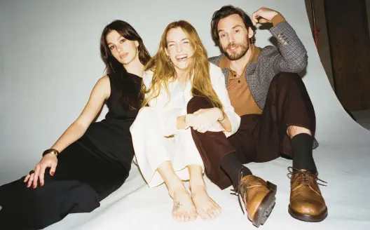  ?? CHANTAL ANDERSON/THE NEW YORK TIMES ?? Camila Morrone, from left, Riley Keough and Sam Claflin, seen Feb. 9 in Los Angeles, star in “Daisy Jones & the Six,” based on Taylor Jenkins Reid’s novel.