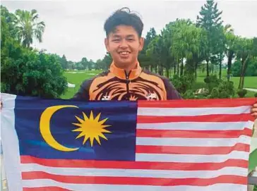  ?? ?? Golfer Ervin Chang after clinching gold in the Individual event yesterday.