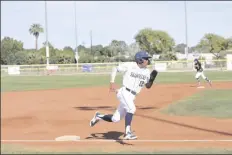  ??  ?? YUMA CATHOLIC SS ALAN ROSAS rounds third base and scores after Christian Ramos delivered an RBI double in the bottom of the first inning during Wednesday’s game agaisnt Lake Havasu at Yuma Catholic.