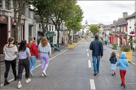  ??  ?? SPACED OUT: Pedestrian­ised zone on New Street, Malahide, Co. Dublin