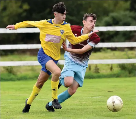  ??  ?? Killorglin’s Dylan Moriarty chased by James Egan, Parkvilla, in their FAI U-17 Cup semi-final last Sunday. Photo by Michelle Cooper Galvin