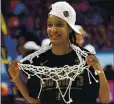  ?? ELSA — GETTY IMAGES ?? Stanford’s Kiana Williams, celebratin­g the Cardinal’s national title, was selected Thursday by the Seattle Storm in the WNBA draft.