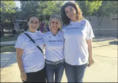  ?? JILL VEJNOSKA /JVEJNOSKA@AJC.COM ?? Lesley Bauer (left), Jen Cox and Sarah Clegg Crawford pause in Roswell’s Riverside Park on Tuesday evening during an al-fresco cavassing effort by members of Pave It Blue.