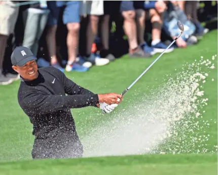  ?? MICHAEL MADRID/USA TODAY SPORTS ?? Tiger Woods got into trouble spots all day in the first round of the Masters but shot 1-over-par 73 and said he feels good about his chances.