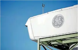  ?? [PHOTO BY LUKE SHARRETT, BLOOMBERG] ?? The GE logo is shown on a wind turbine used for training and research outside of the General Electric energy plant in Greenville, S.C.