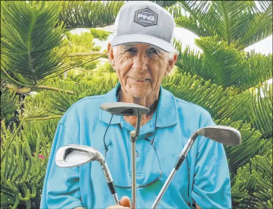  ?? Babe Hiskey ?? Bryant “Babe” Hiskey, 50 years later, with a few of the historic Ping clubs he used to capture the 1970 Sahara Invitation­al.
