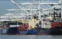  ?? BEN MARGOT — THE ASSOCIATED PRESS ?? Container ships wait to be unloaded at the Port of Oakland on Wednesday in Oakland The U.S. trade deficit rose in January to the highest level since October 2008, defying President Donald Trump’s efforts to bring more balance to America’s trade with...