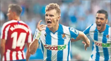  ??  ?? DECISIVO. Odegaard anotó el primer gol en la victoria de la Real Sociedad frente al Atlético en Anoeta.