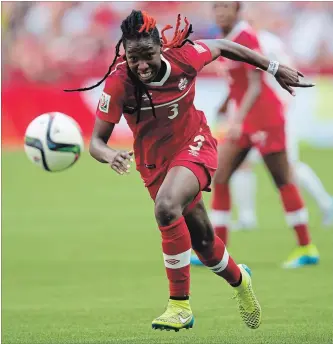  ?? DARRYL DYCK THE CANADIAN PRESS ?? Canada's Kadeisha Buchanan chases down the ball during FIFA Women's World Cup quarter-final soccer action against England in Vancouver in 2015. Buchanan, a Brampton native, is a profession­al player in France. She will play for Canada Sunday in an...
