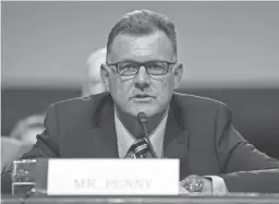  ?? CAROLYN KASTER/AP ?? Former USA Gymnastics president Steve Penny invokes his right not to answer questions during a Senate hearing on June 5.