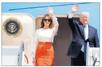  ?? AP PHOTO ?? President Donald Trump and first lady Melania Trump, wave as they board Air Force One at Andrews Air Force Base, Md., Friday, prior to his departure on his first overseas trip.