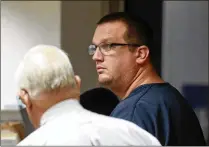  ?? BRUCE R. BENNETT / THE PALM BEACH POST ?? Palm Beach County sheriff’s Deputy Adam Godbey, 38, made his first court appearance on Friday. He is charged with 30 counts of possessing child pornograph­y. Godbey has worked at the sheriff’s office for four years.