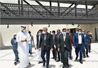  ??  ?? Shah Mahmood Qureshi (centre) along with various officials at the Expo 2020 Dubai site on Sunday.