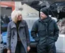  ?? JONATHAN PRIME - FOCUS FEATURES ?? Oscar winner Charlize Theron as Lorraine Broughton and director David Leitch on the set of “Atomic Blonde.” Theron explodes into summer in a breakneck actionthri­ller that follows MI6’s most lethal assassin through a ticking time bomb of a city...