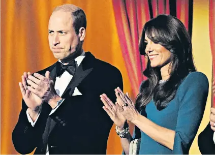  ?? ?? Royal round of applause: the Prince and Princess of Wales, pictured at last month’s Royal Variety Performanc­e, often unfairly get it in the neck